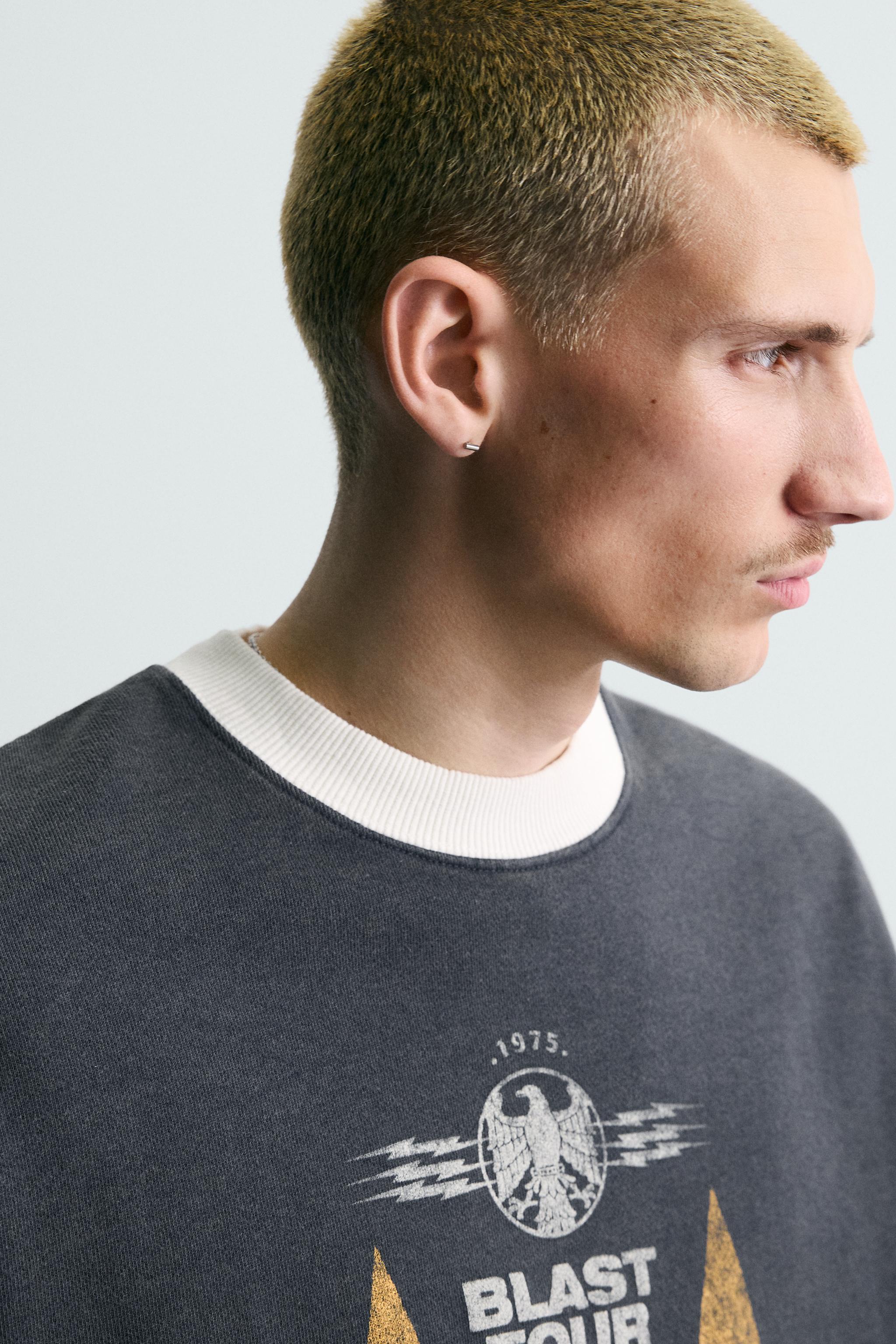 SWEAT AVEC IMPRIMÉ DÉLAVÉ